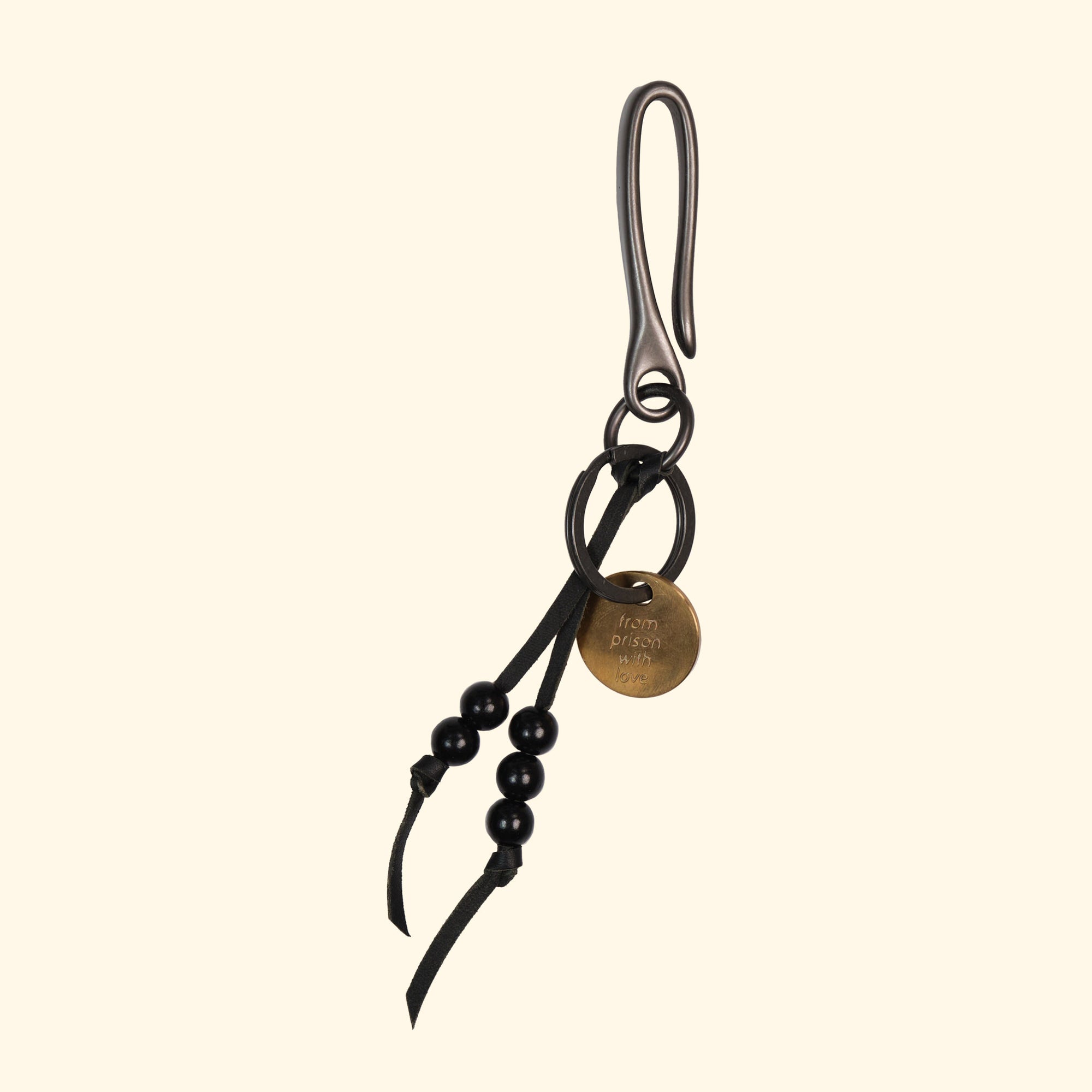 https://www.oldpassion.ch/cdn/shop/products/Japanese-Fish-Hook-Key-Chain-Japanischer-Schlusselhaken-Messing-black-gunmetal-oldpassion-from-prison-with-love_2000x.jpg?v=1675874787