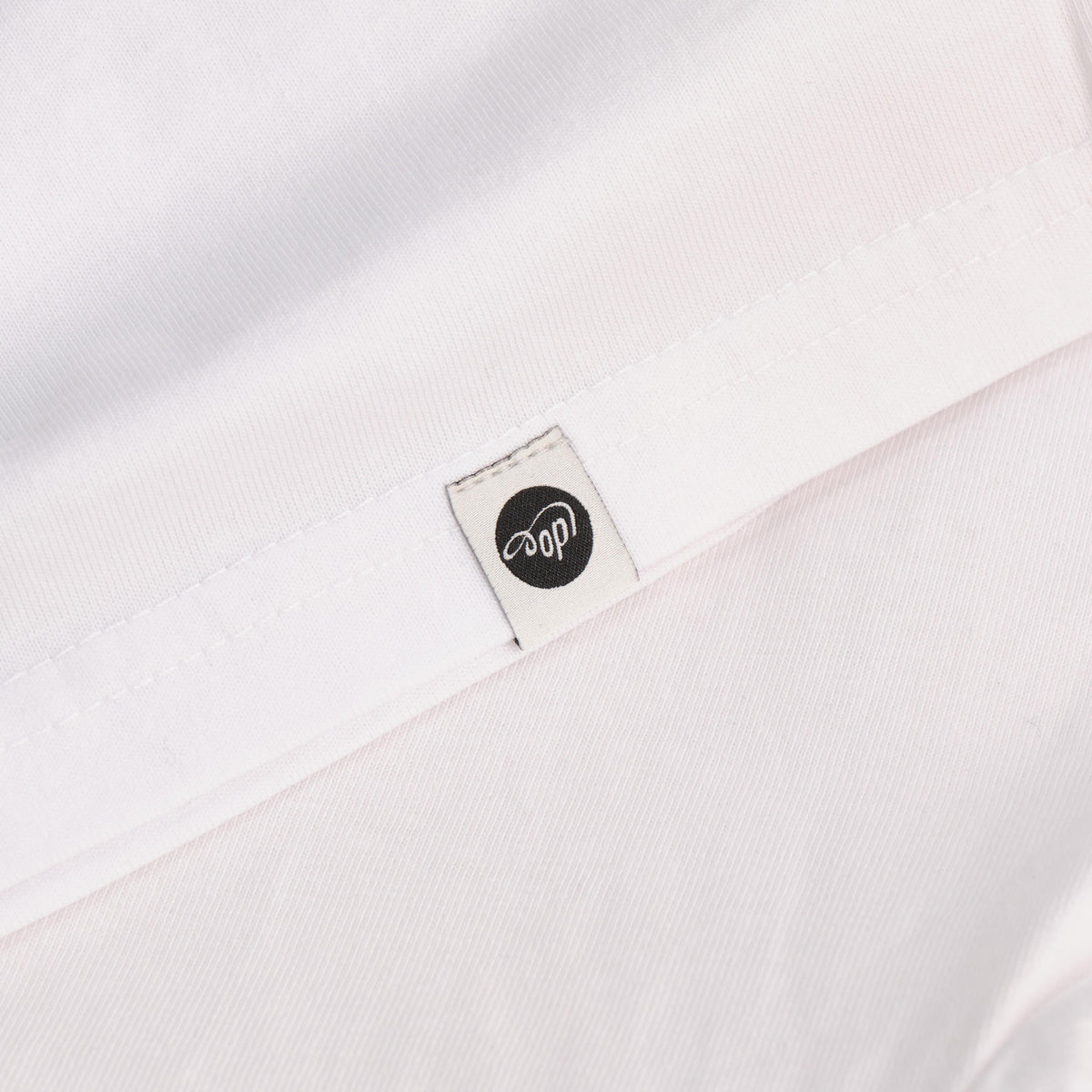 tee-t-shirt-oldpassion-apparel-co.-from-prison-with-love-weiss-webetikette-label-saum-vorderseite